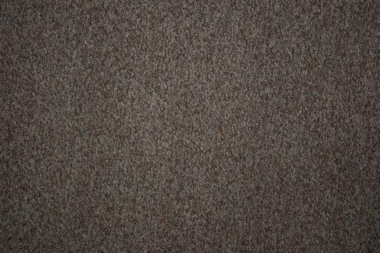 Bouclé Möbelstoff in naturfarbener Beige-Grau-Melange mit strukturierter Oberfläche Detailaufnahme der Stoffstruktur