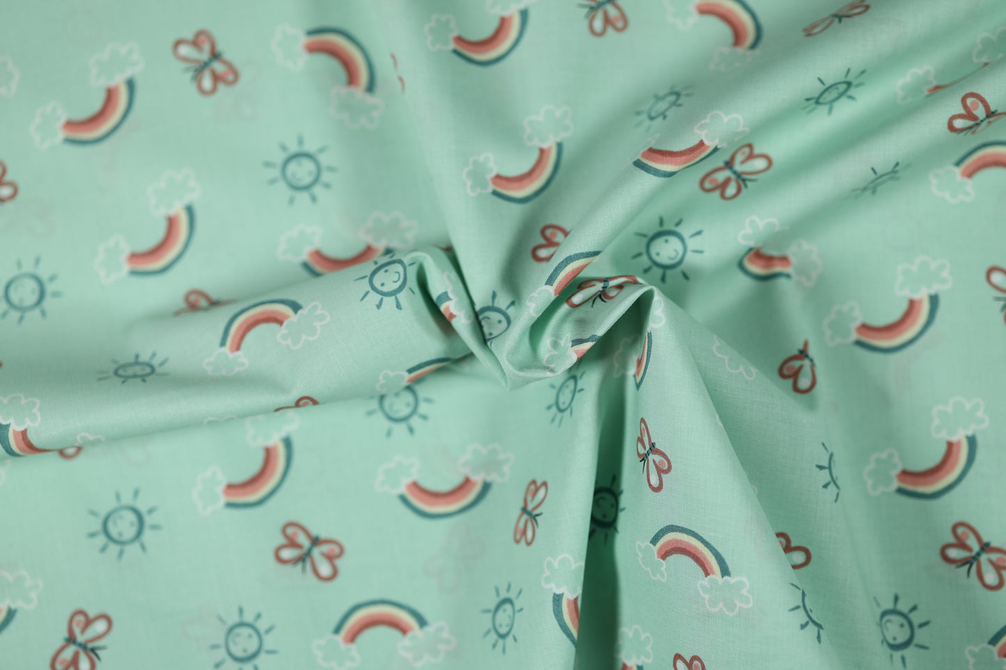Elastischer Baumwollstoff Regenbogenfreude – Mint mit weichem Griff