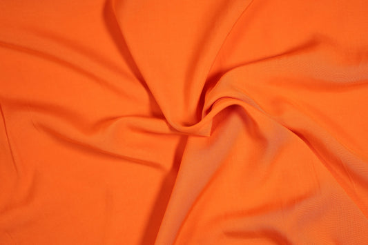 Leichter Viskosestoff in Signalorange – ideal für Kleider und Blusen