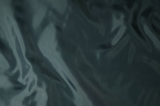 Futterstoff dunkelgrün glänzend – hochwertige Verarbeitung