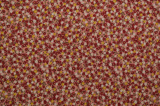Baumwollstoff Ditsy-Blumen Pink Rot – Nahaufnahme des Musters metrware