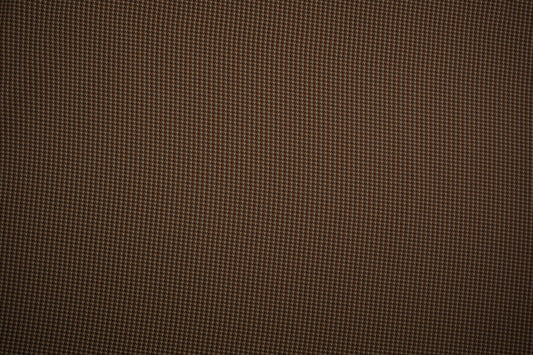 Wollstoff mit feinem braunen Pepita-Muster – ideal für Mäntel und Jacken
