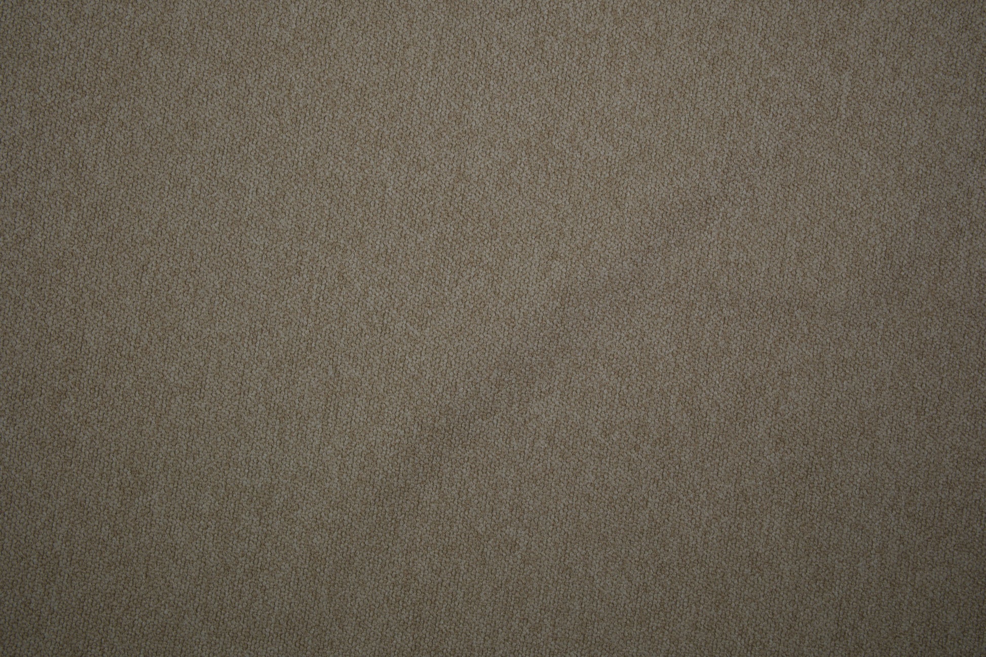 Möbelstoff Bouclé in Sandbeige als Polsterstoff für Sofa und Sessel Detailaufnahme der Stoffstruktur