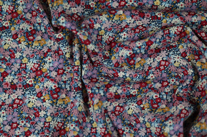 Baumwollstretch – Verspielte Blümchen auf Navy und Rosa – angenehm, flexibel und hochwertig verarbeitet