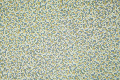 Floraler Baumwoll-Stretchstoff in Blaubeere & Zitrone – ideal für Bekleidung und kreative Projekte