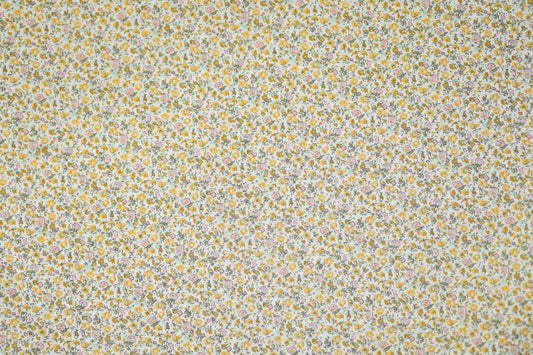 Floraler Baumwoll-Stretchstoff in Goldene Wiesenblumen – ideal für Bekleidung und kreative Projekte