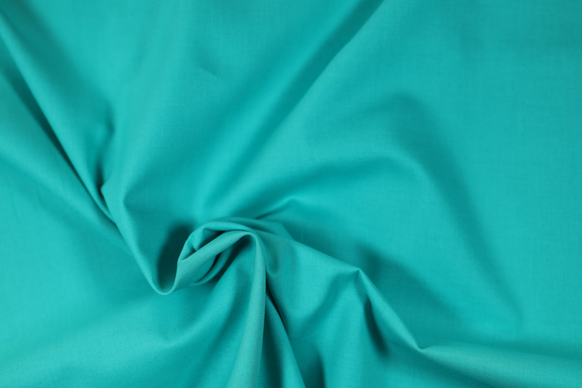 Türkisgrün Baumwollstoff mit Stretch – perfekt für Kleidung und DIY-Projekte