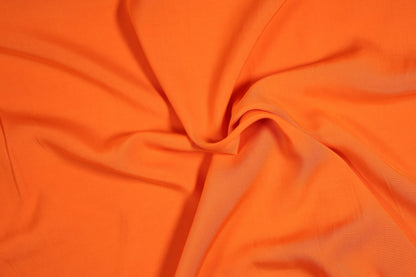 Leichter Viskosestoff in Signalorange – ideal für Kleider und Blusen