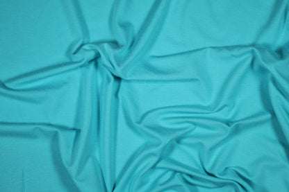 Jersey Stoff aus Viskose in Türkis – perfekt für Shirts und Kleider