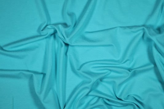 Jersey Stoff aus Viskose in Türkis – perfekt für Shirts und Kleider