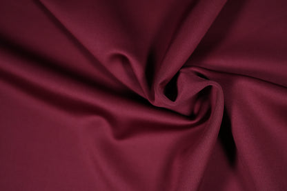 Scuba Stretch Stoff in edlem dunklem Bordeaux mit glatter Textur – ideal für Abendmode