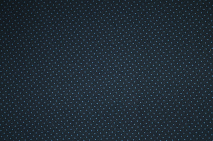 Baumwollstoff mit Motiv: marineblau mit feinen punkten – weich & kindgerecht.