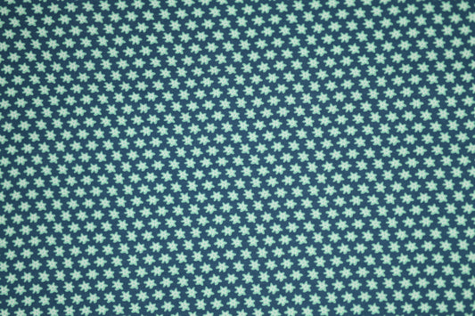 Kleine Blüten auf Marineblau – hochwertiger Baumwollstoff für Kinder und kreative Projekte.