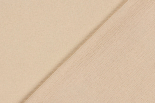 Detailaufnahme Musselin Stoff beige mit typischer gekreppter Struktur